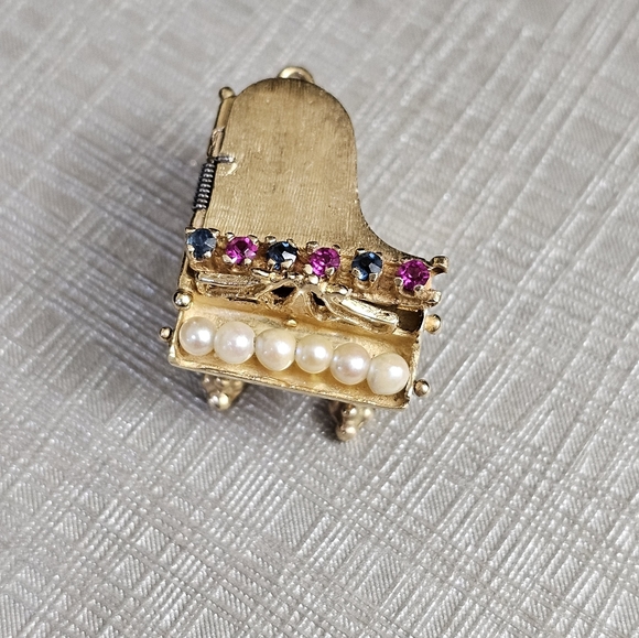 Stampd Jewelry - 14k piano locket pendant with genuine rubies, sapphires, and pearls. Stamped 14k